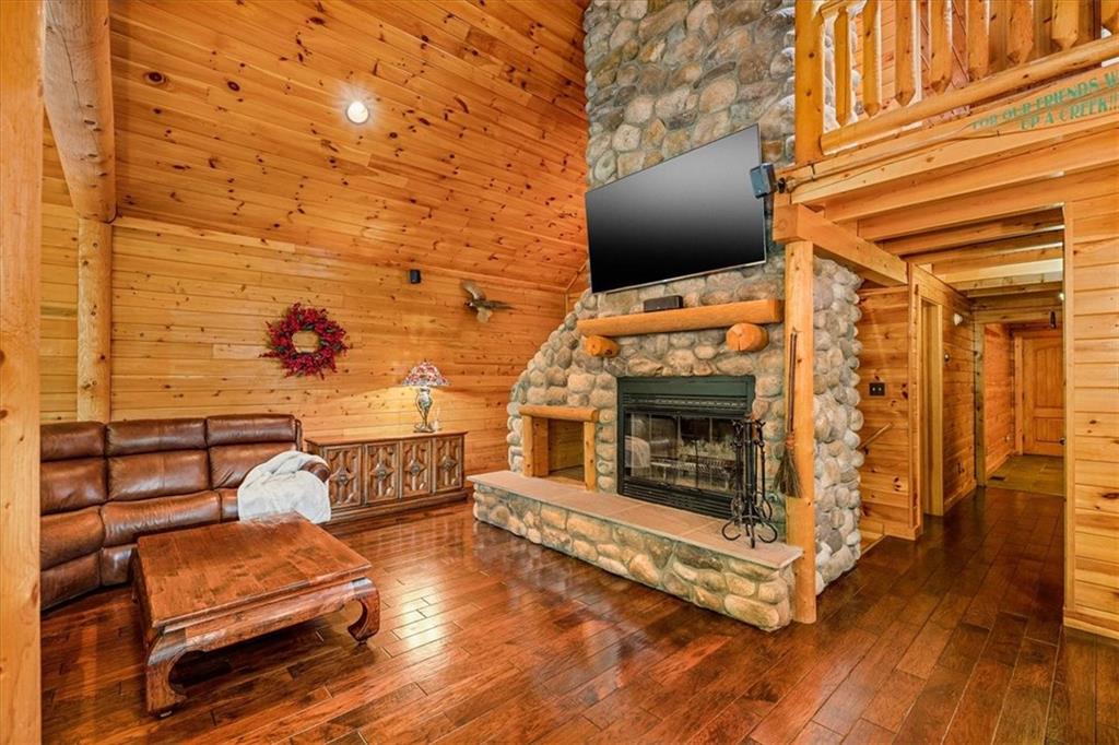 159 Brownsdale Road Butler, PA 16002 - Photo 13 of 50 a view of outdoor seating space with wooden floor and fireplace