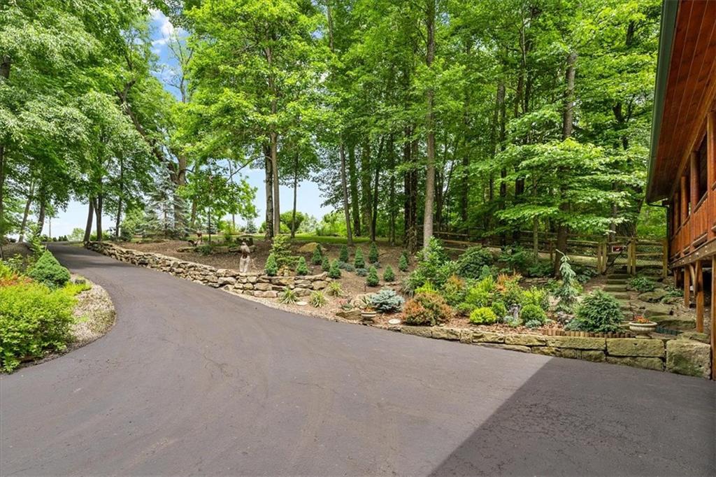 159 Brownsdale Road Butler, PA 16002 - Photo 46 of 50 a view of a garden with plants and trees