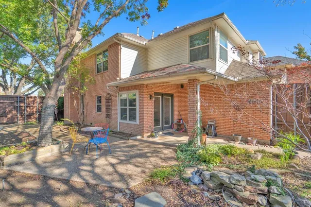 a front view of a house with patio