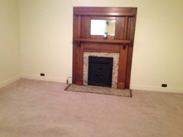 196 Glosson Road Gray, GA 31032 - Photo 15 of 40 a view of an empty room with a fireplace