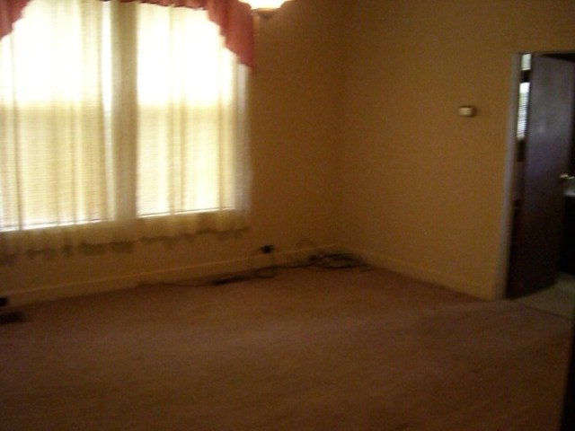 196 Glosson Road Gray, GA 31032 - Photo 38 of 40 a view of an empty room and a window