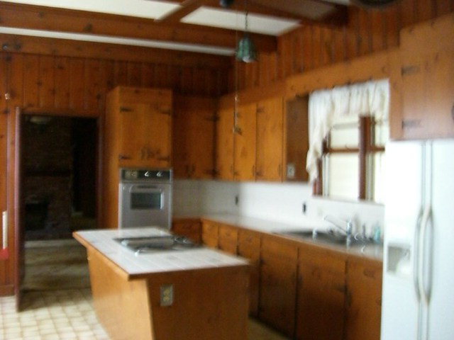 196 Glosson Road Gray, GA 31032 - Photo 10 of 40 a kitchen with sink cabinets and window
