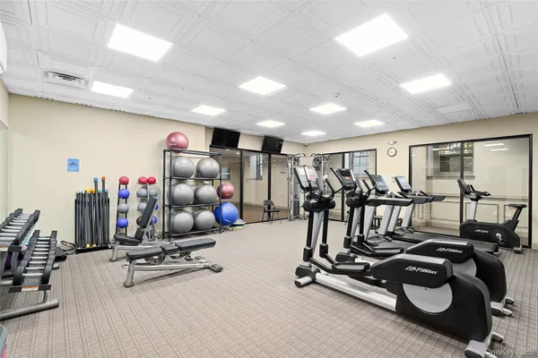 a view of a room with gym equipment