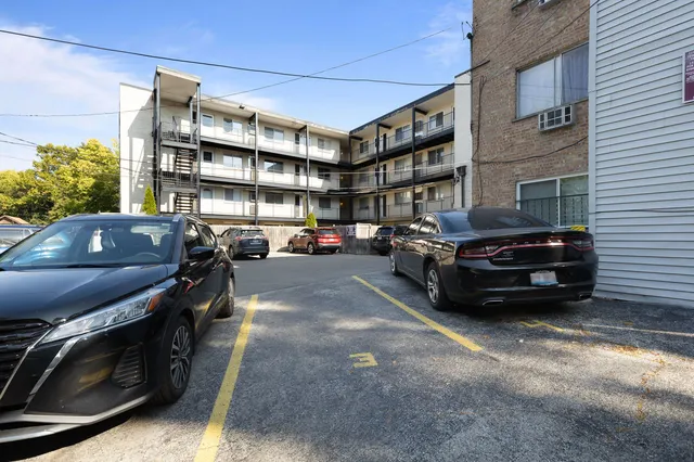 a car parked in front of a building