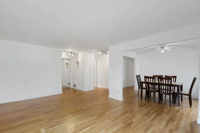 a view of a livingroom with furniture and wooden floor