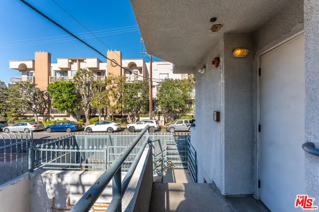 a view of swimming pool from a balcony