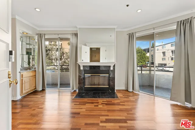 a view of a kitchen with a sink a kitchen and a window