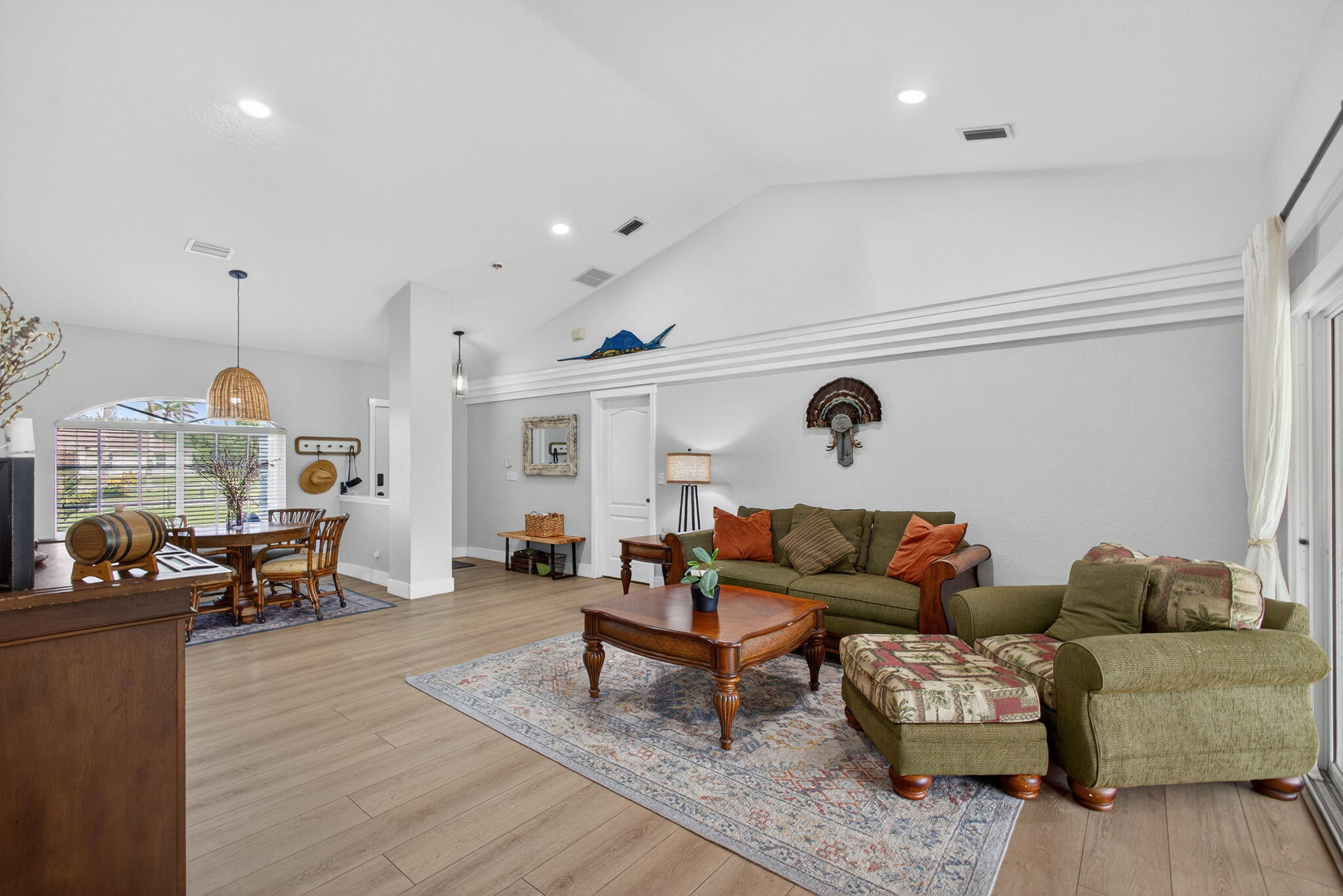 14366 76th Road North The Acreage, FL 33470 - Photo 16 of 76 a living room with furniture and a wooden floor