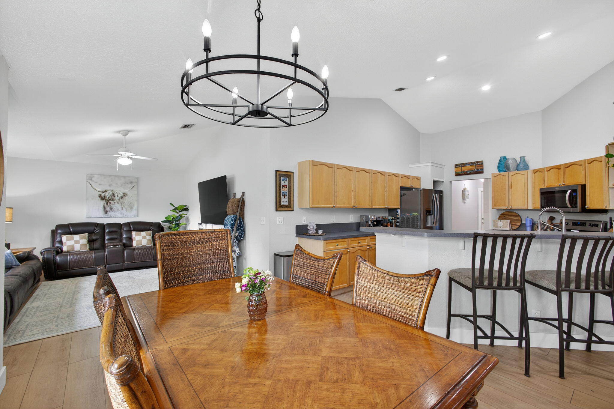 14366 76th Road North The Acreage, FL 33470 - Photo 24 of 76 a living room with furniture kitchen view and a large mirror