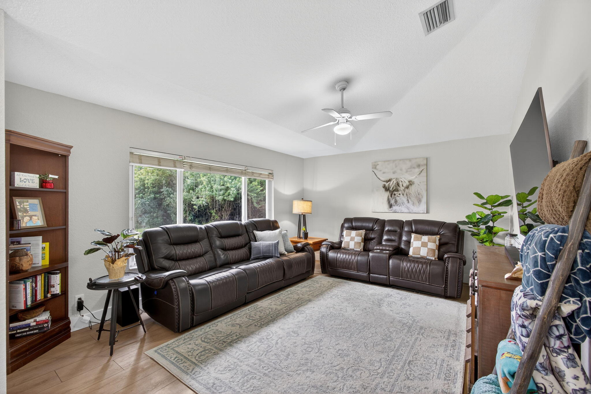 14366 76th Road North The Acreage, FL 33470 - Photo 26 of 76 a living room with furniture and a potted plant