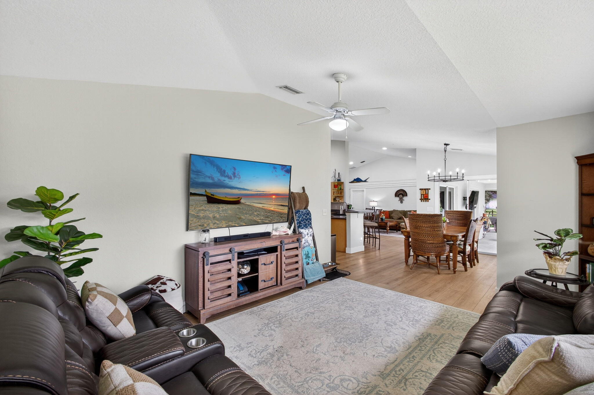 14366 76th Road North The Acreage, FL 33470 - Photo 29 of 76 a living room with furniture and a flat screen tv