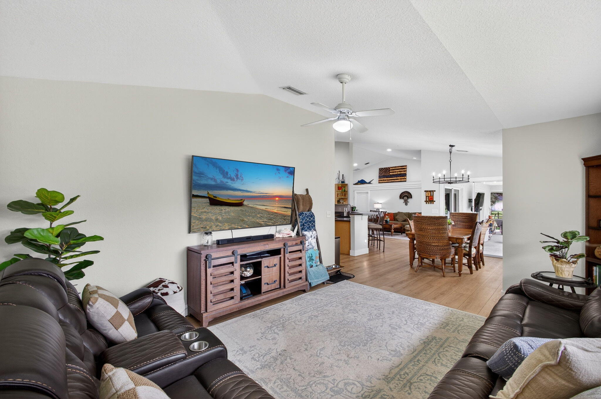 14366 76th Road North The Acreage, FL 33470 - Photo 30 of 76 a living room with furniture and a flat screen tv