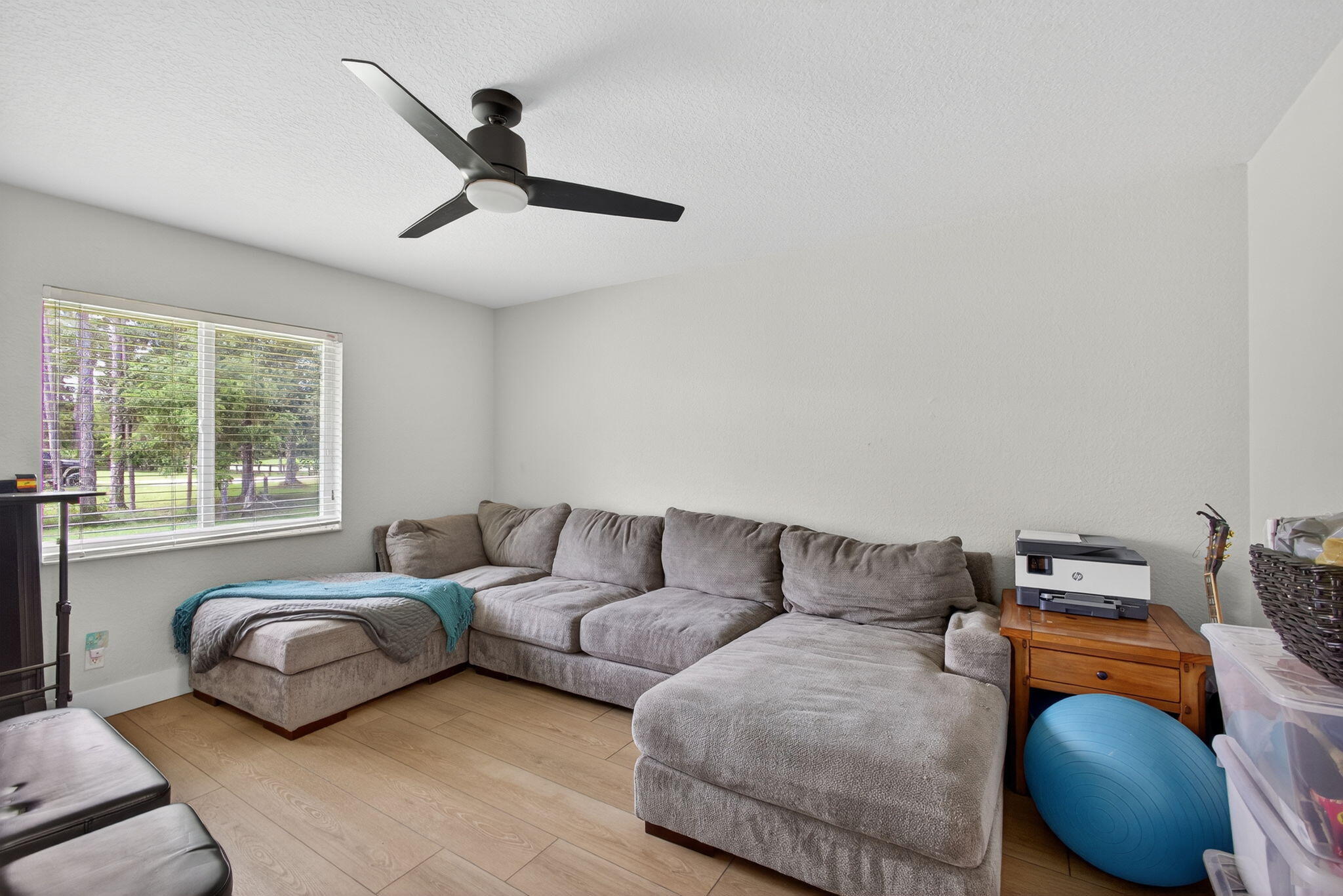 14366 76th Road North The Acreage, FL 33470 - Photo 41 of 76 a living room with furniture and a window