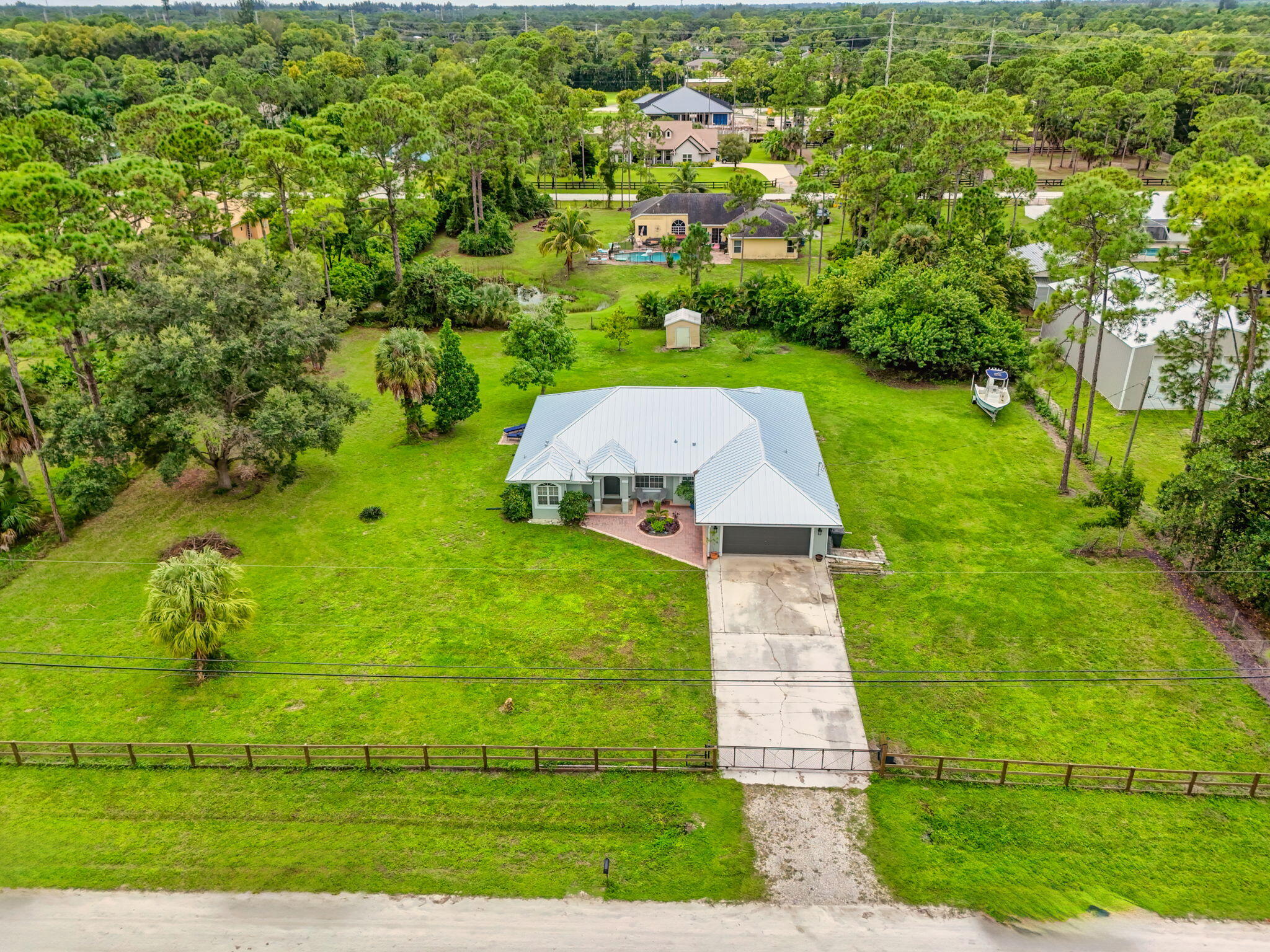 14366 76th Road North The Acreage, FL 33470 - Photo 68 of 76 68-web-or-mls-DJI_20251011121316_0038_DJ