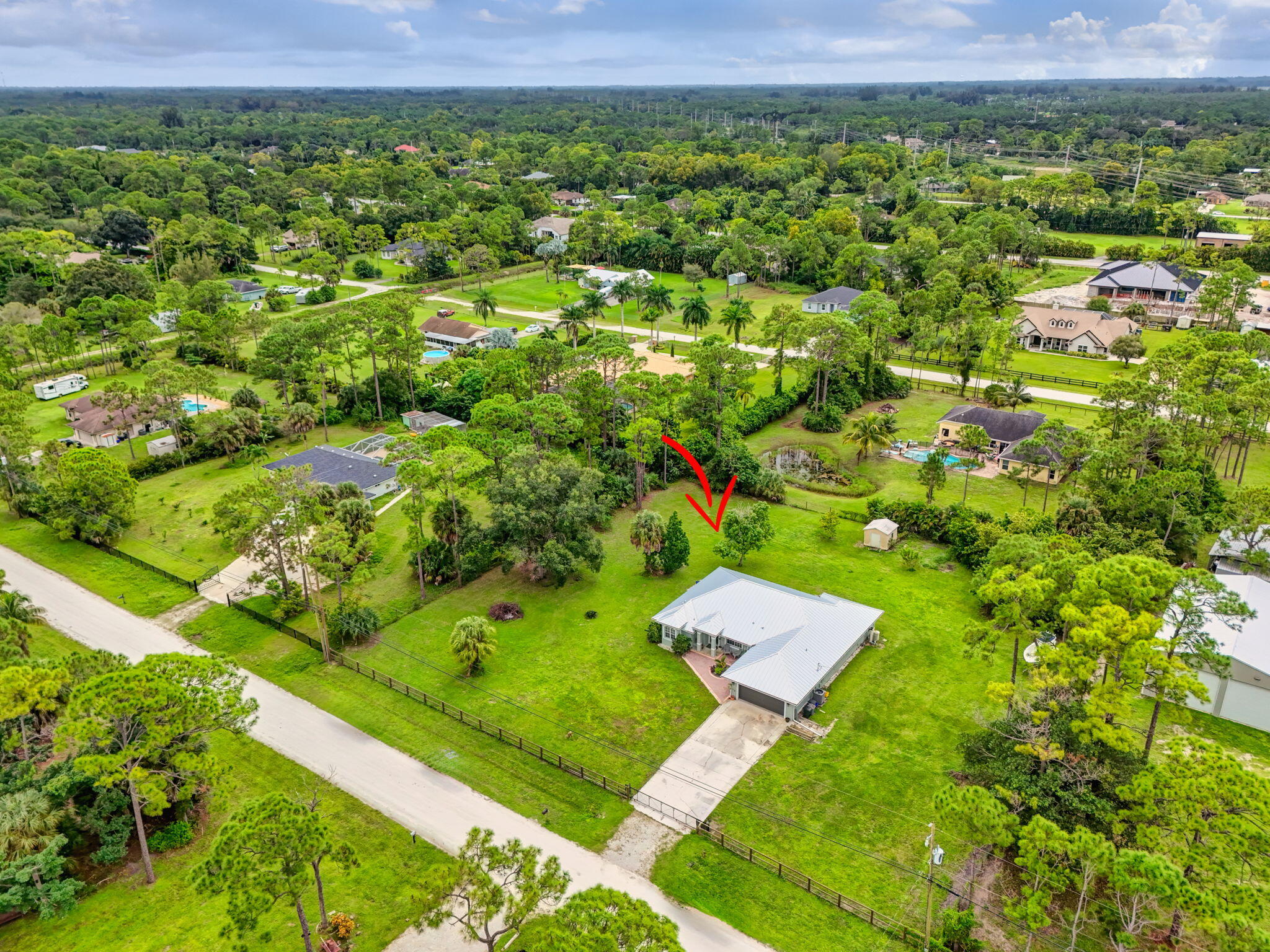 14366 76th Road North The Acreage, FL 33470 - Photo 71 of 76 71-web-or-mls-DJI_20251011121358_0053_DJ