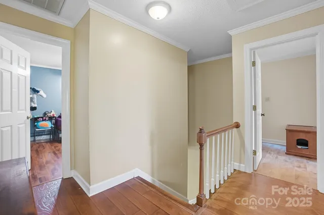 a view of a hallway and interior of the house