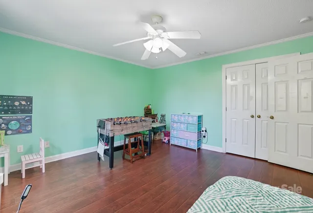 a view of a livingroom with furniture and wooden floor