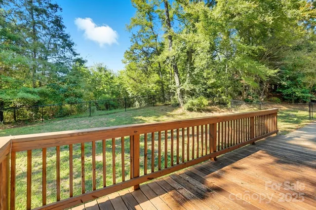a view of a wooden roof deck