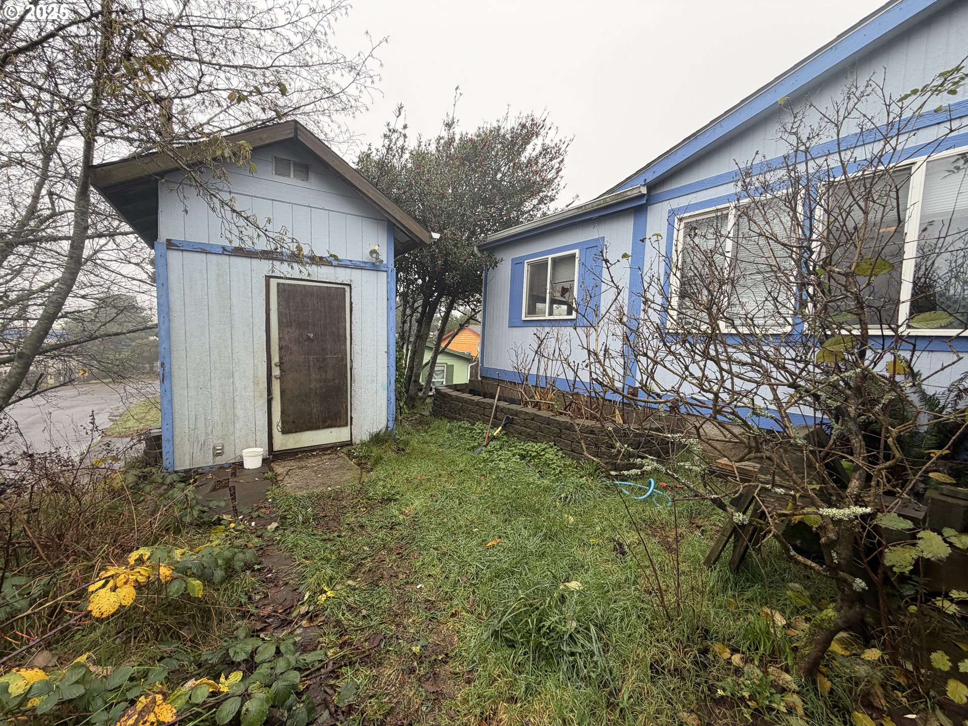 252 Northwest 20th Street Newport, OR 97365 - Photo 12 of 15 a view of a house with a yard