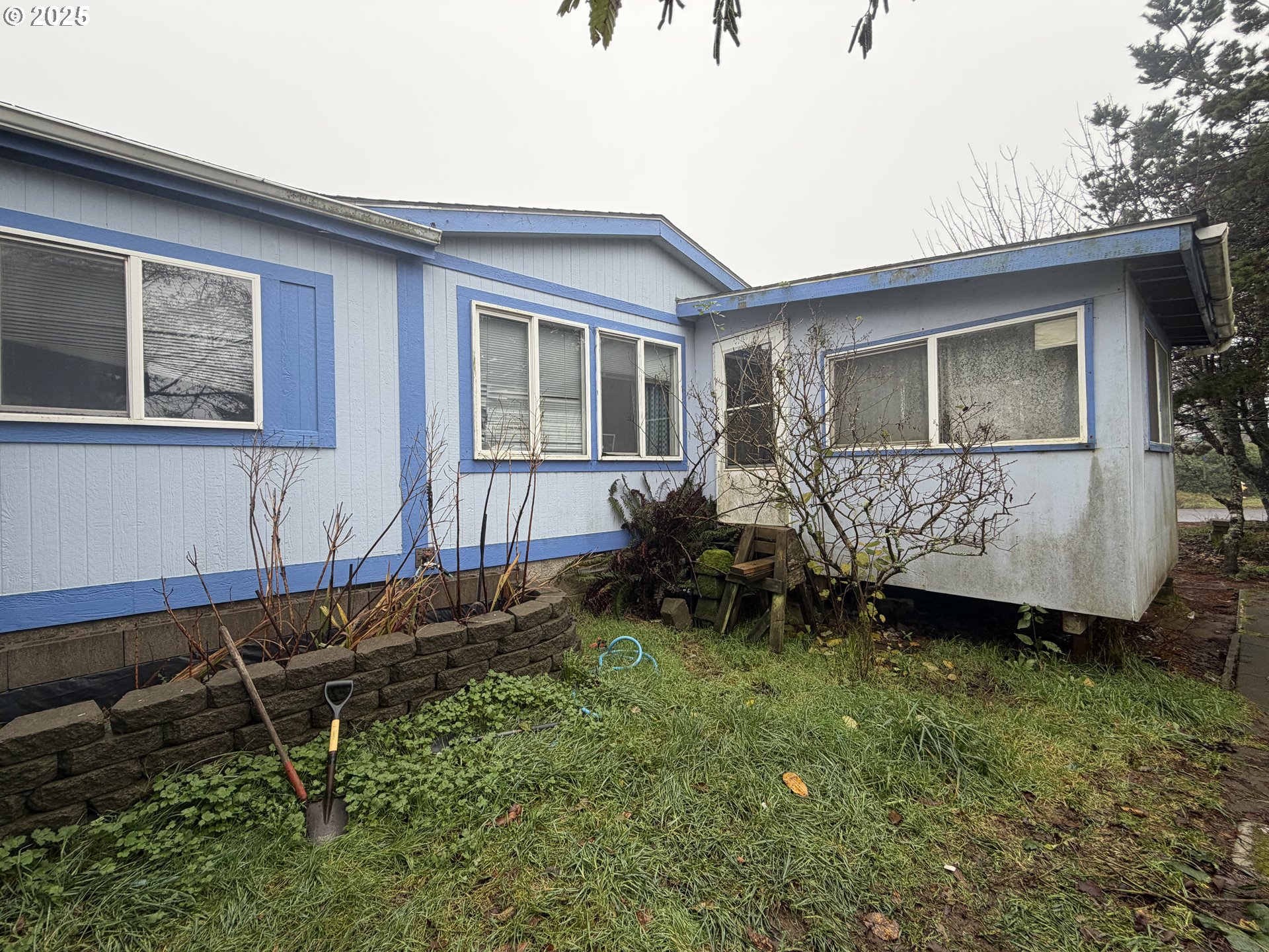 252 Northwest 20th Street Newport, OR 97365 - Photo 13 of 15 a view of a house with backyard and sitting area