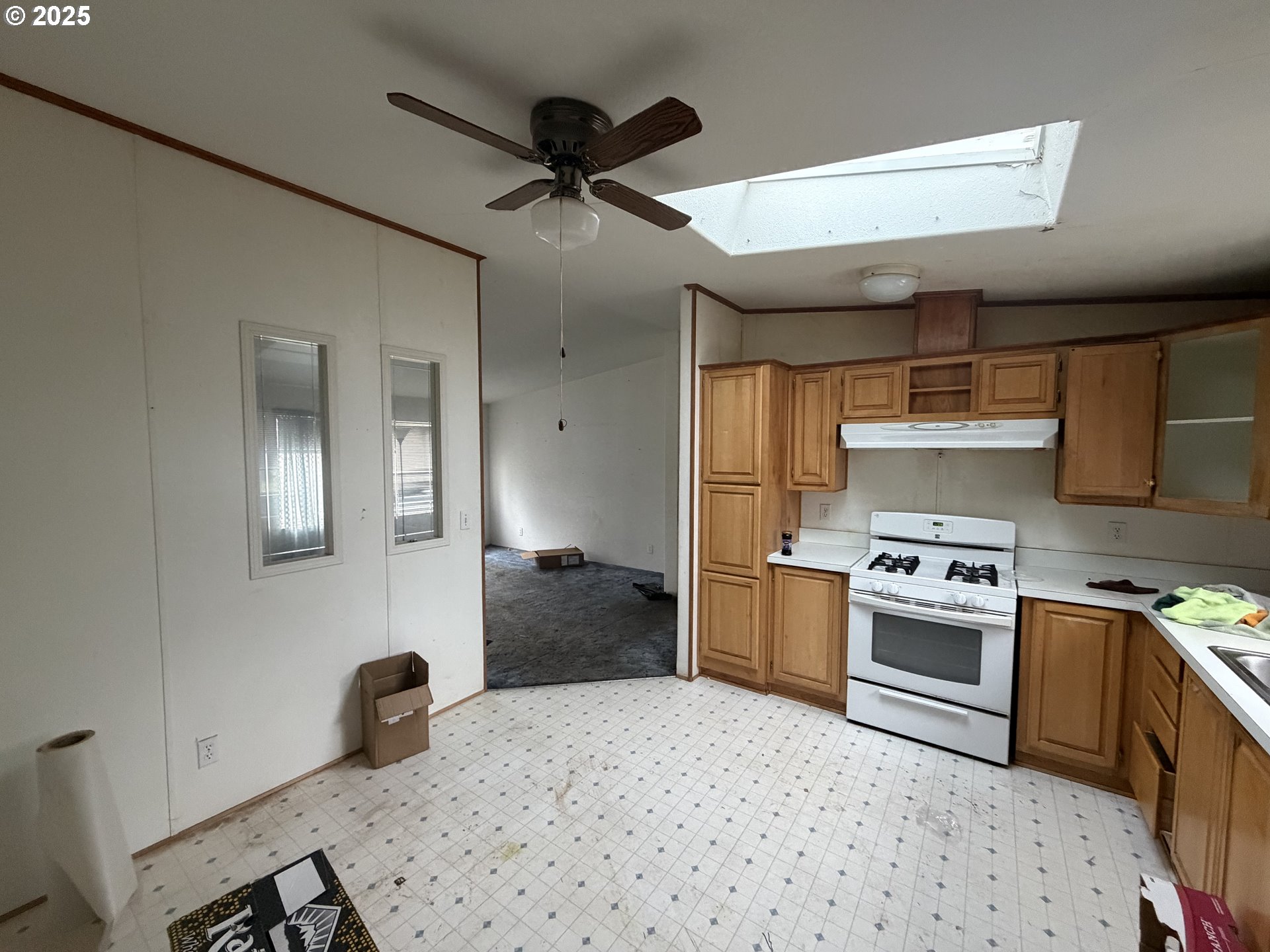 252 Northwest 20th Street Newport, OR 97365 - Photo 3 of 15 a kitchen with a stove and a microwave