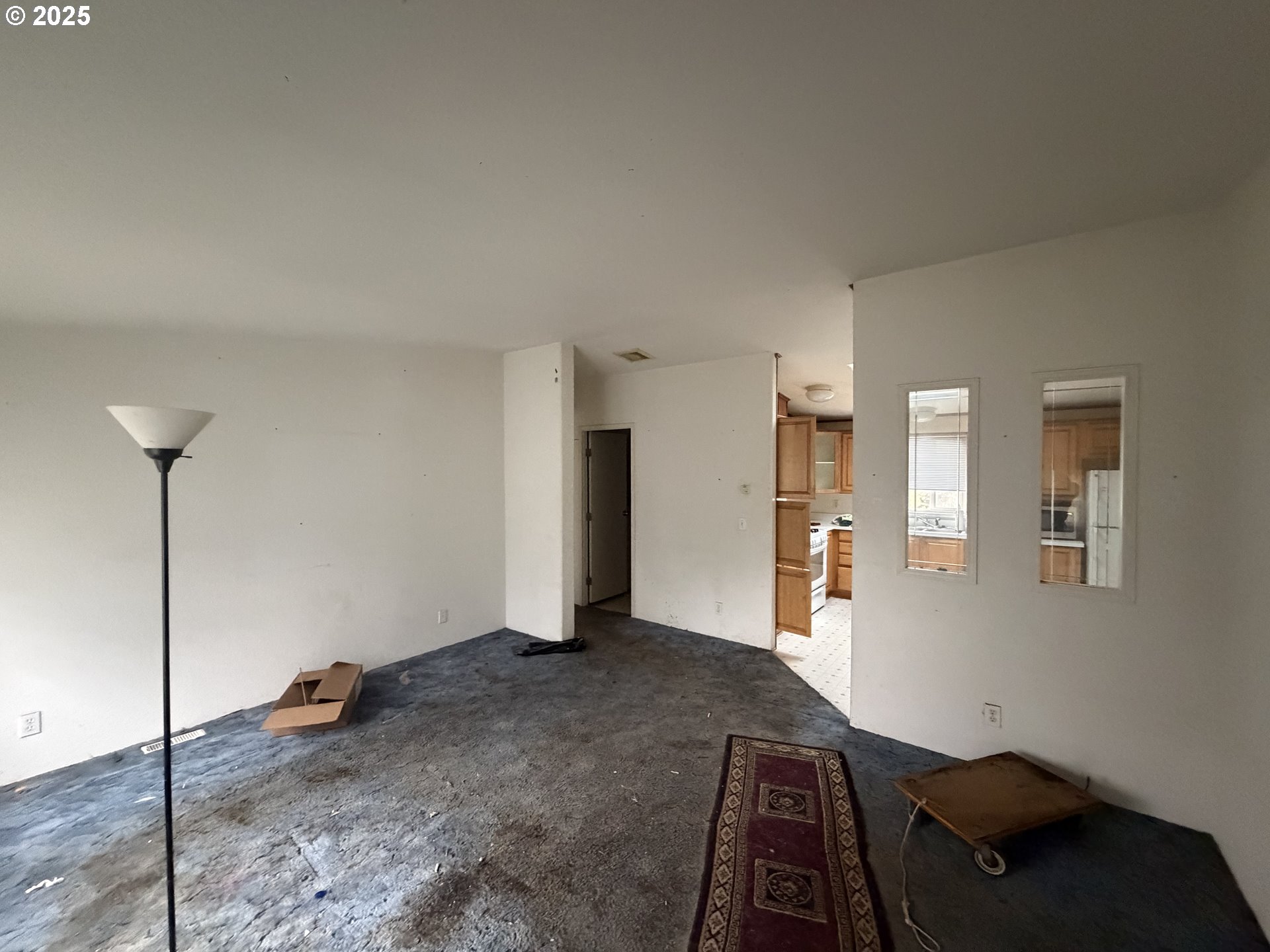 252 Northwest 20th Street Newport, OR 97365 - Photo 9 of 15 a view of a livingroom with wooden floor and stairs