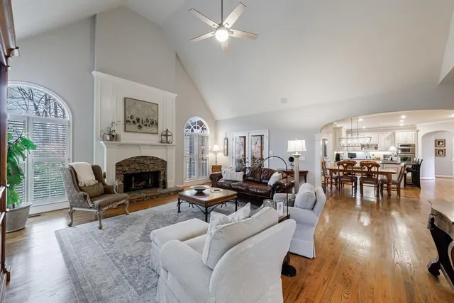 a view of a roof deck with wooden floor and fence