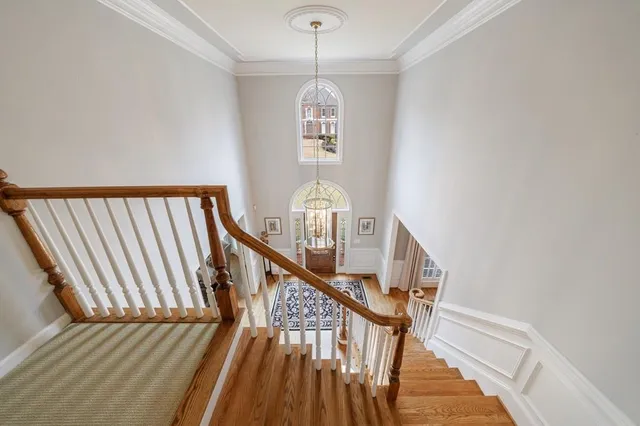 a bed room with a bed and a night stand