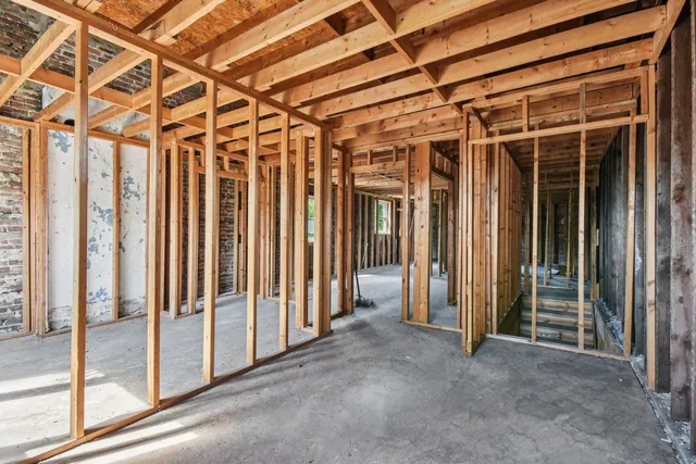a view of entryway with wooden walls