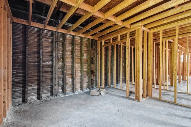 a view of a porch with wooden floor and stairs