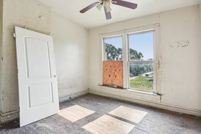 an empty room with window