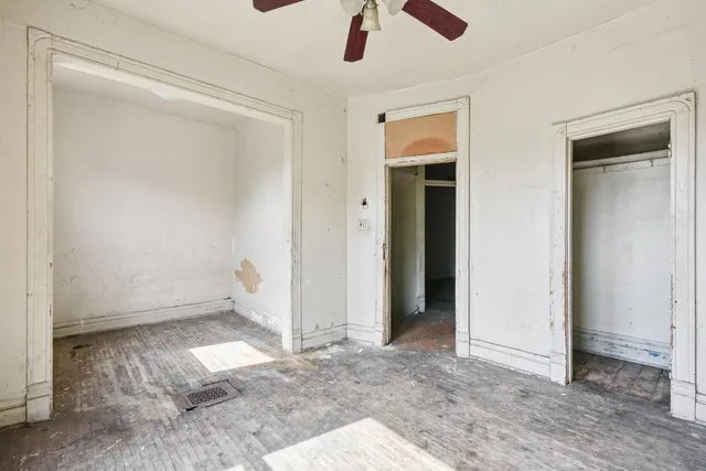 an empty room with a bench