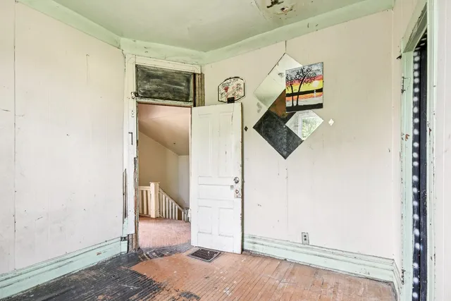 a bathroom with a tub and shower