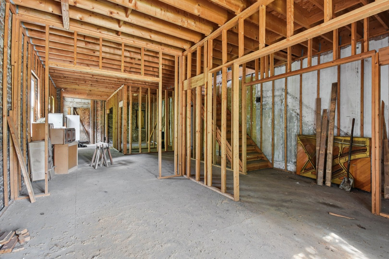 420 West 65th Place Chicago, IL 60621 - Photo 6 of 45 a view of an empty room with stairs