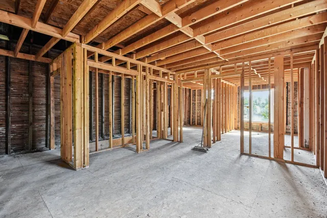 a view of a room with wooden walls