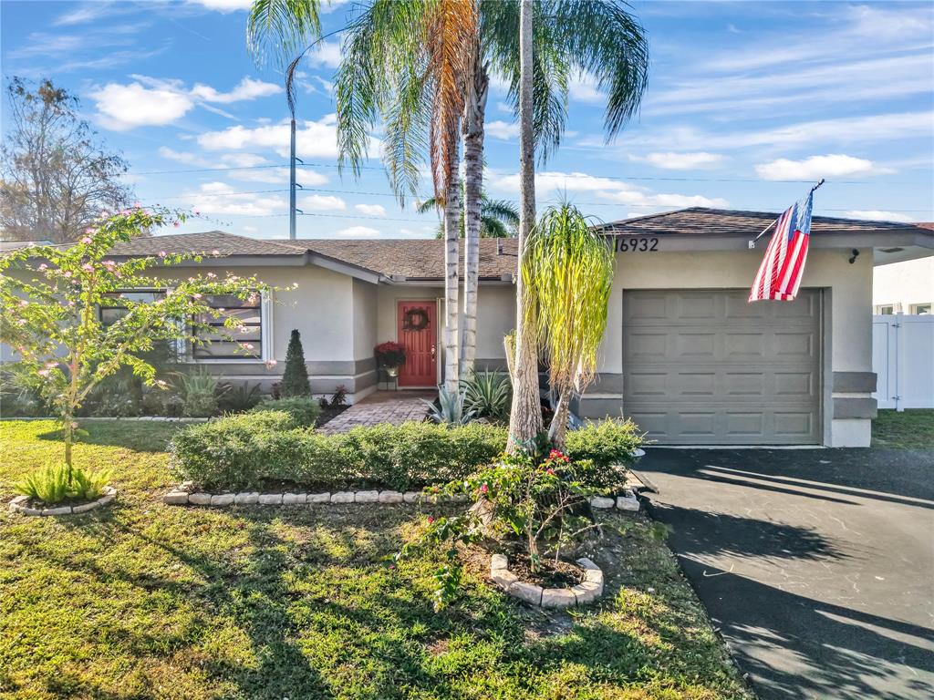 Welcome Home! Quiet treelined street, beautiful landscaping, 4+ car driveway.