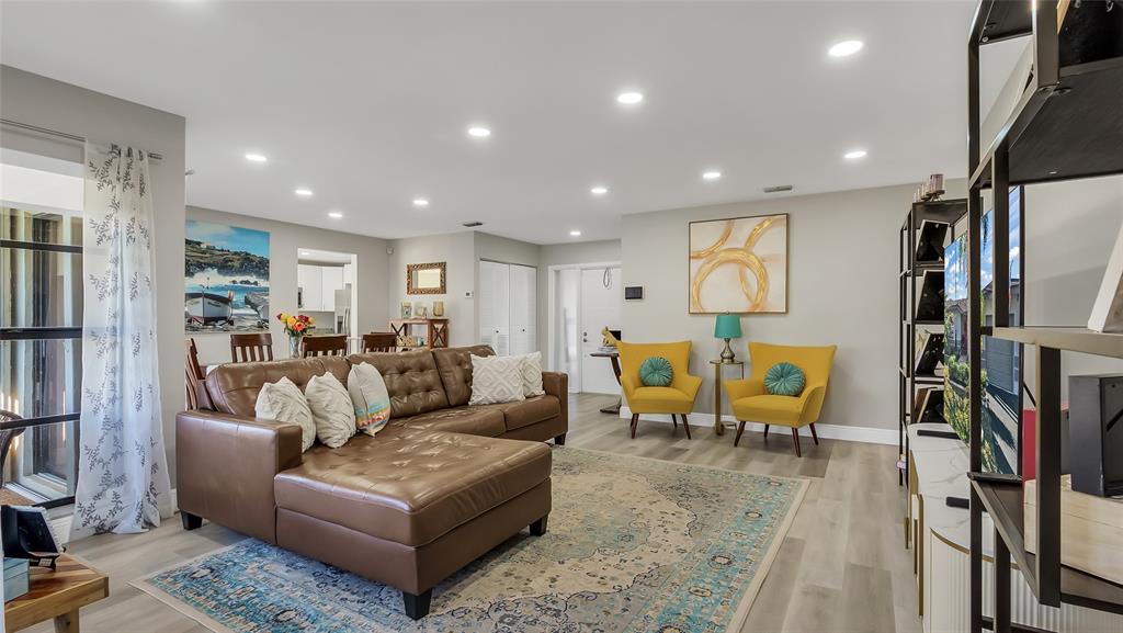 16932 Southwest 5th Way Weston, FL 33326 - Photo 4 of 49 Modern & Airy with ample light streaming from the large windows overlooking to pool and canal.