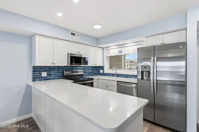 $675,000 | 1401 Canal Drive, Unit 3, Carolina Beach, NC 28428