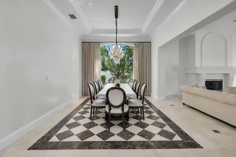 a living room with a rug and a rug