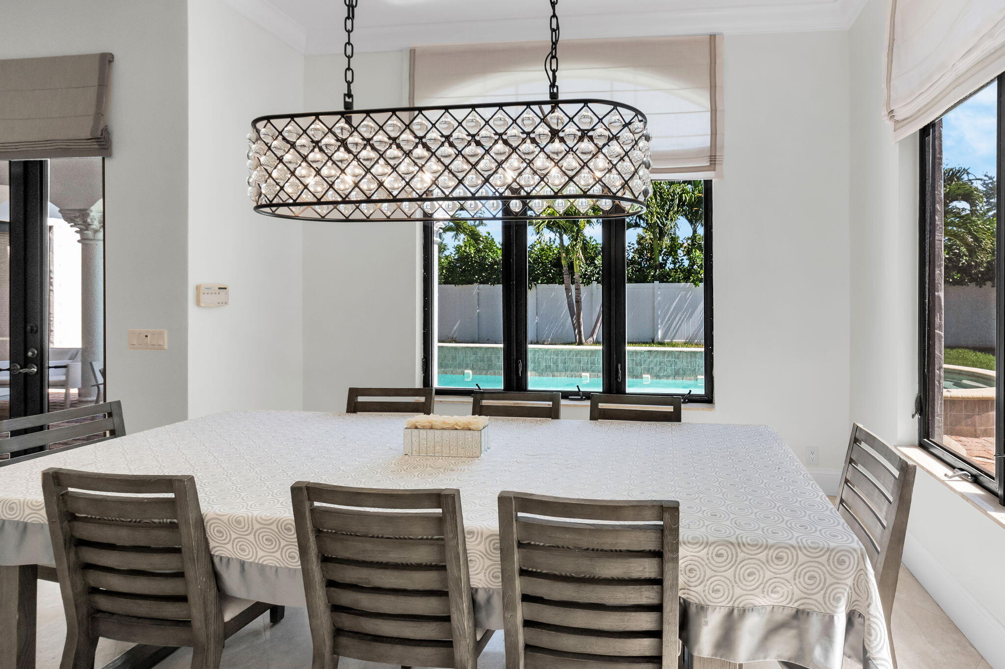 22175 Larkspur Trail Boca Raton, FL 33433 - Photo 19 of 40 a view of a dining room with furniture window and outside view