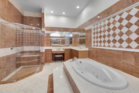 a bathroom with a bathtub and a sink