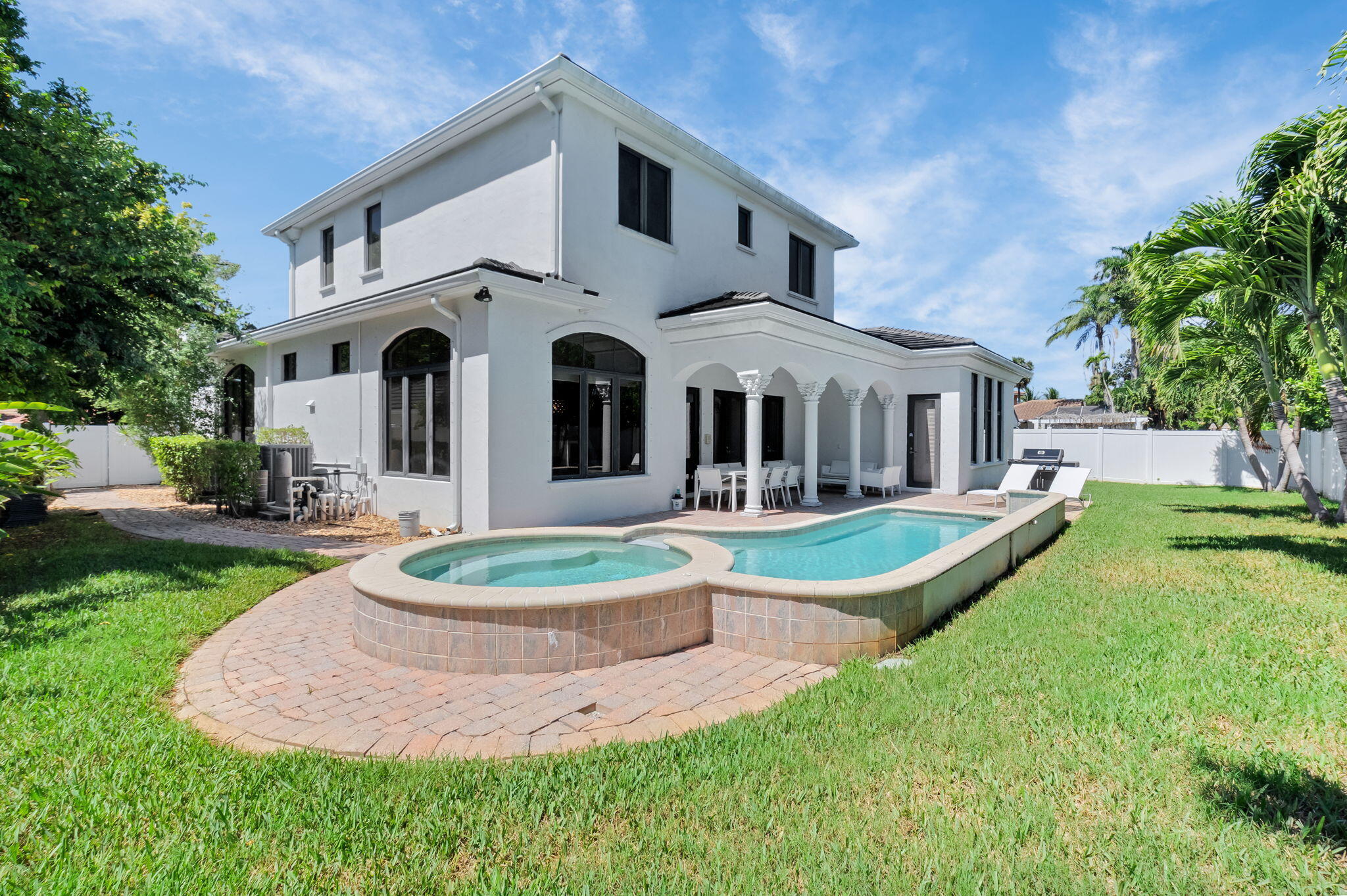 22175 Larkspur Trail Boca Raton, FL 33433 - Photo 38 of 40 a front view of a house with a yard