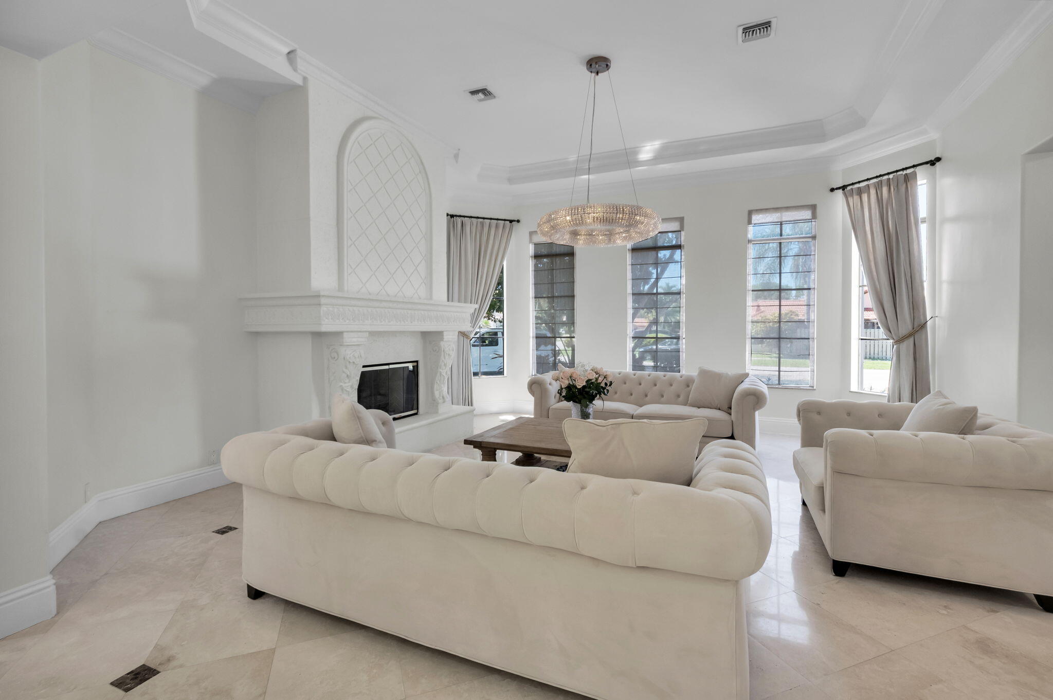 22175 Larkspur Trail Boca Raton, FL 33433 - Photo 9 of 40 a living room with furniture and a fireplace