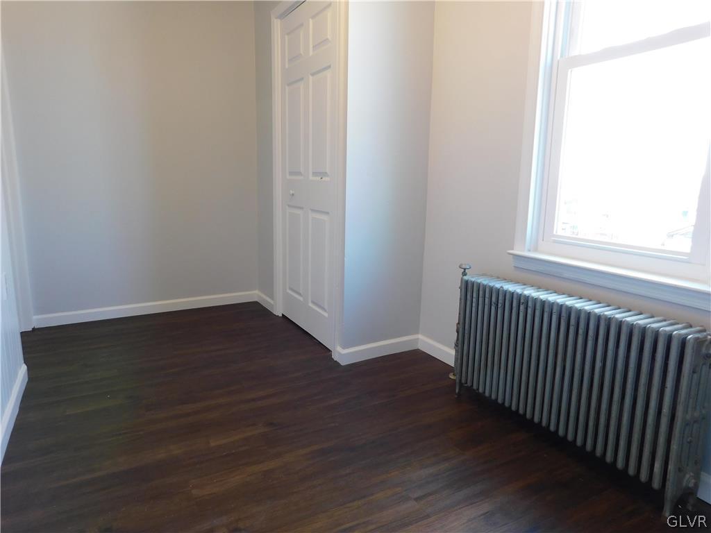 213 Penn Street Bath, PA 18014 - Photo 17 of 35 a view of a hallway with wooden floor