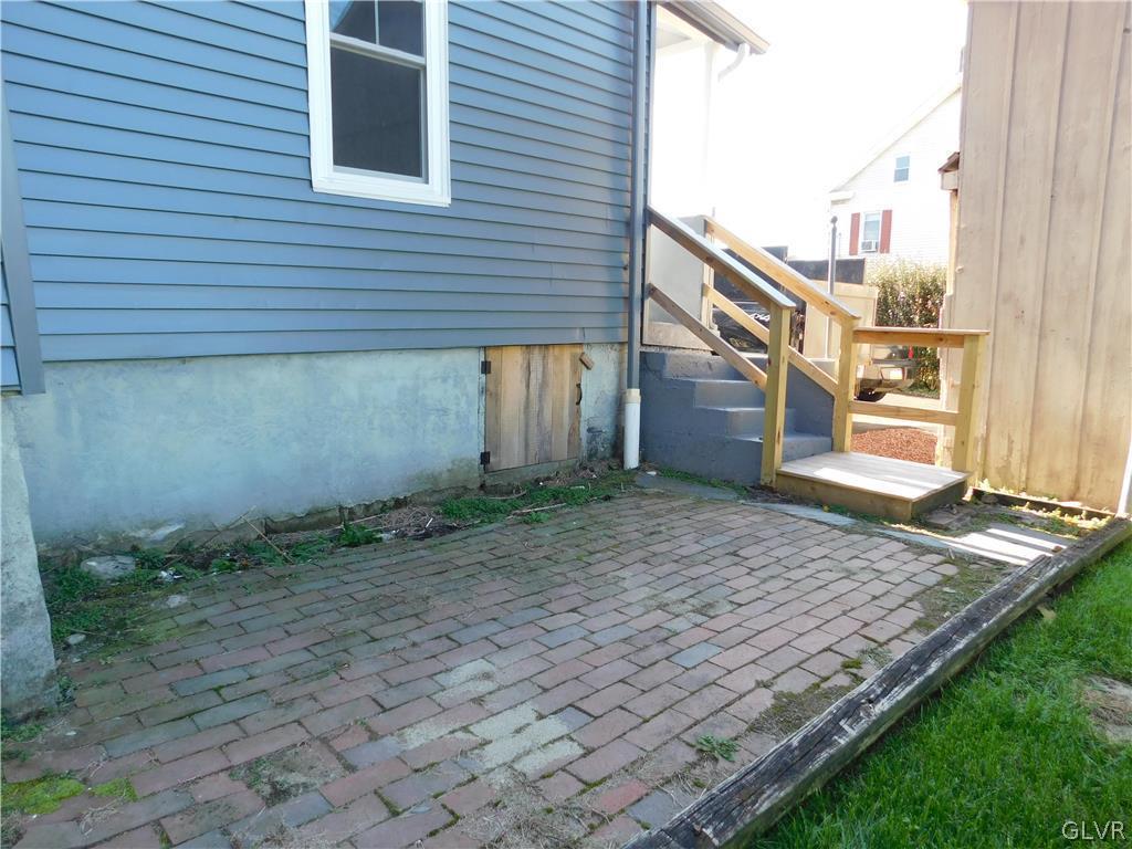 213 Penn Street Bath, PA 18014 - Photo 34 of 35 a view of a backyard with a wooden fence