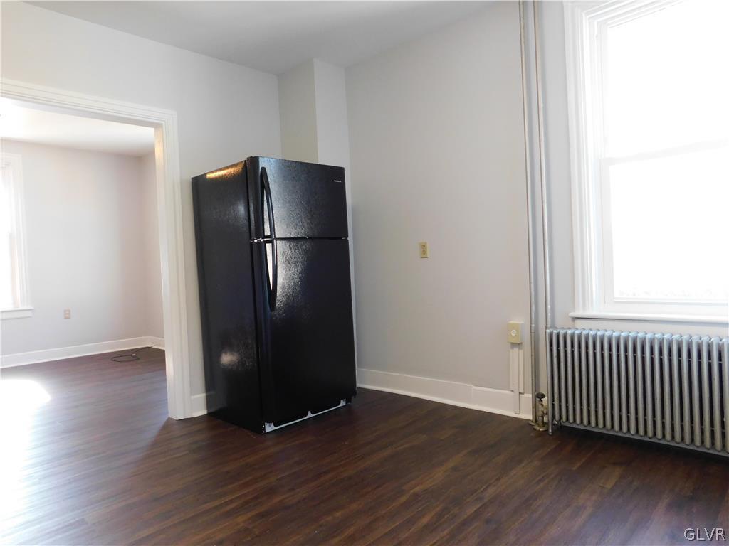 213 Penn Street Bath, PA 18014 - Photo 7 of 35 an empty room with wooden floor and closet