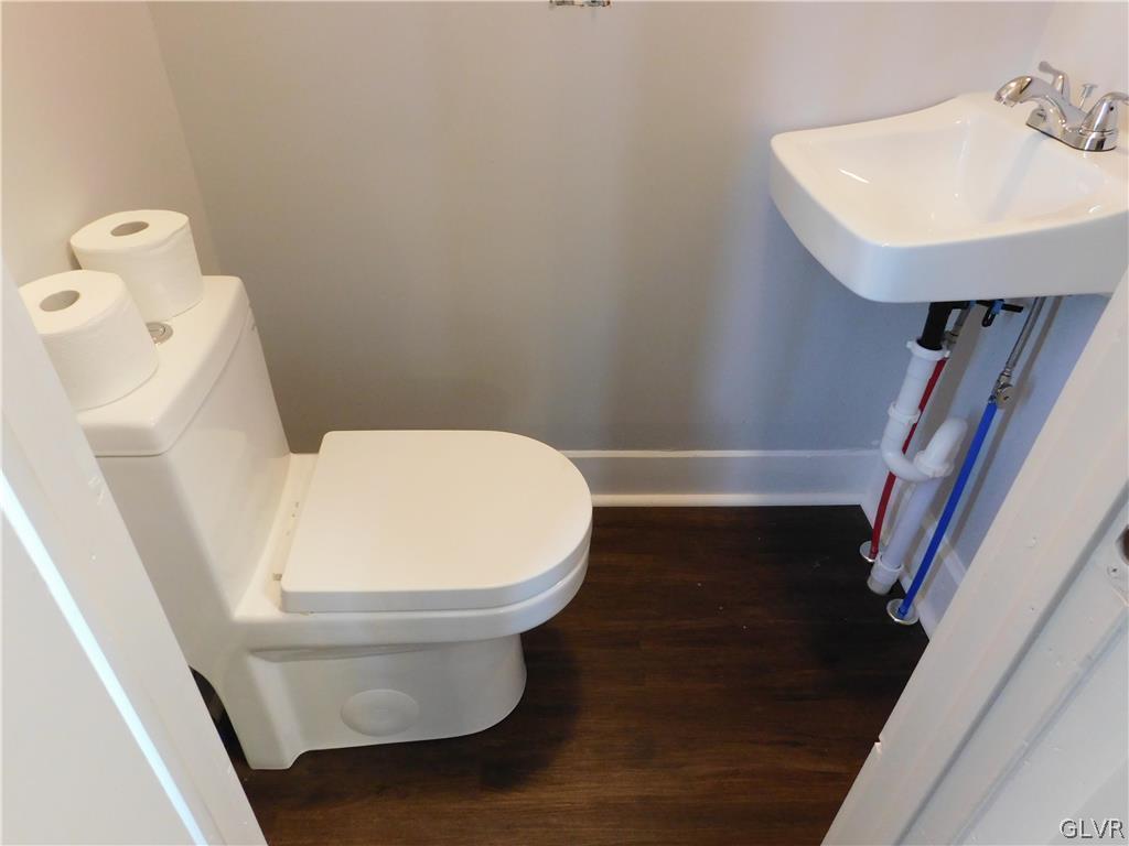 213 Penn Street Bath, PA 18014 - Photo 8 of 35 a bathroom with a toilet and a sink