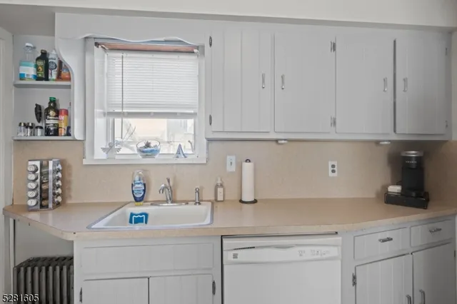 a room with furniture and a window