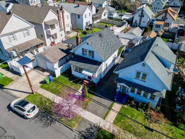 a aerial view of a house with a garden