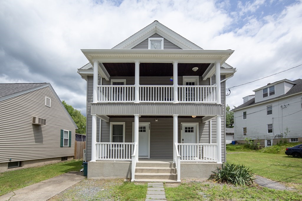 137 Mendon Road Attleboro, MA 02703 - Photo 1 of 24 a front view of a house with a yard